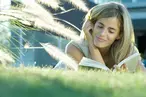 Female reader on lawn