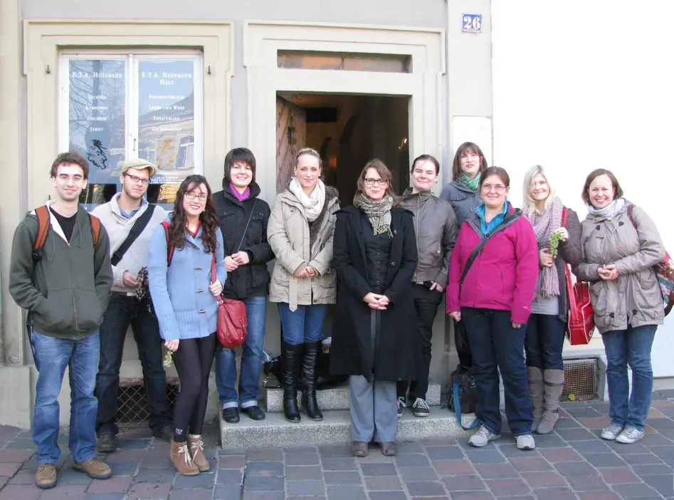 Group photo in front of the house.